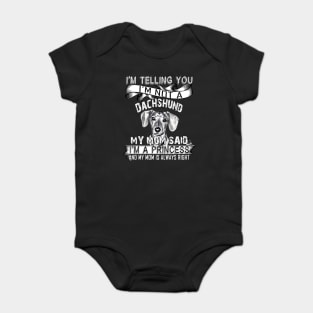 I'm telling you i'm not a dachshund Baby Bodysuit